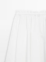 Flowing asymmetric midi skirt