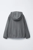LIGHTWEIGHT PACKABLE WINDBREAKER