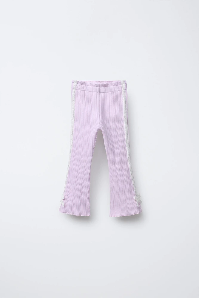 SIDE STRIPE TIE FLARE PANTS