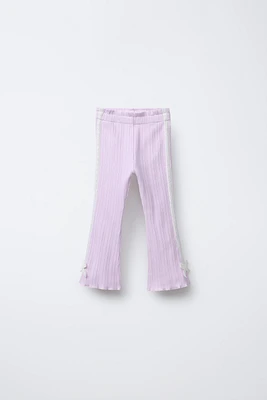 PANTALON FLARE AVEC BANDE LATÉRALE ET LACET