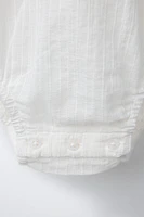 BOUND NECKLINE BODYSUIT