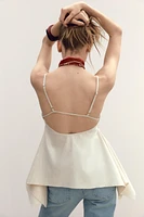 TOP PÉPLUM ASYMÉTRIQUE