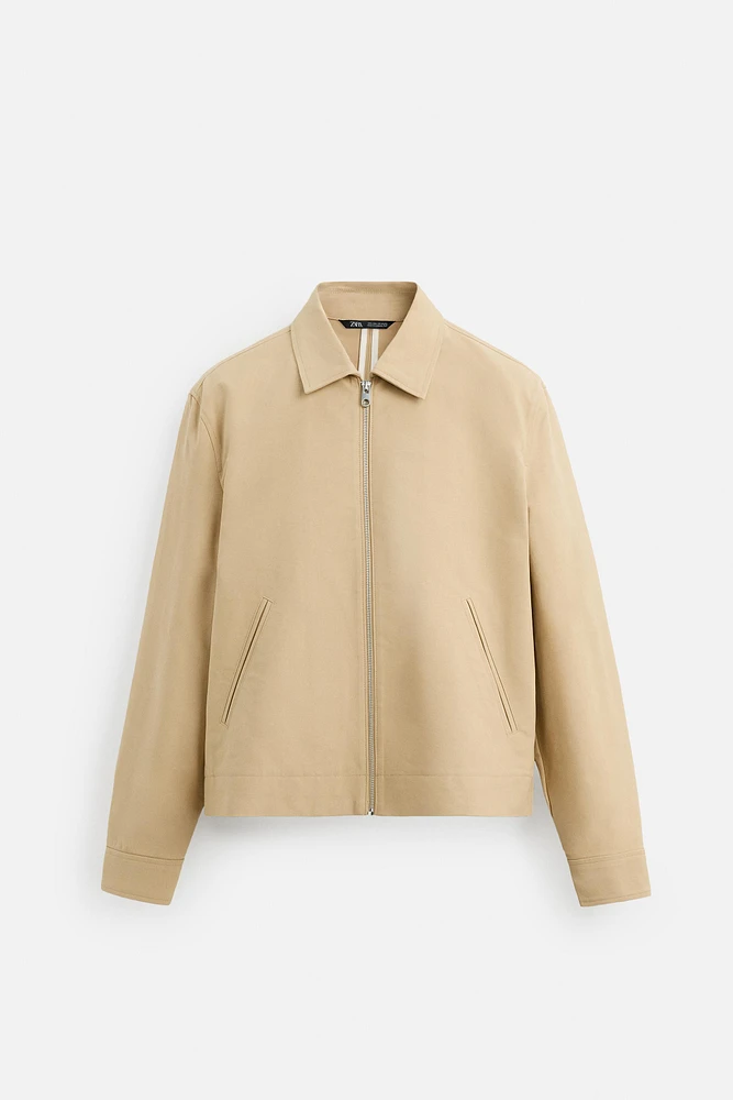 PIPED SEAM JACKET