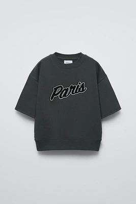 PLUSH RUFFLY PATCH TOP