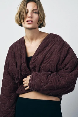 KIMONO EN VELOURS MATELASSÉ SURPIQUÉ