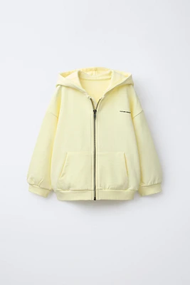 HOODED SWEATSHIRT WITH RAISED TEXT