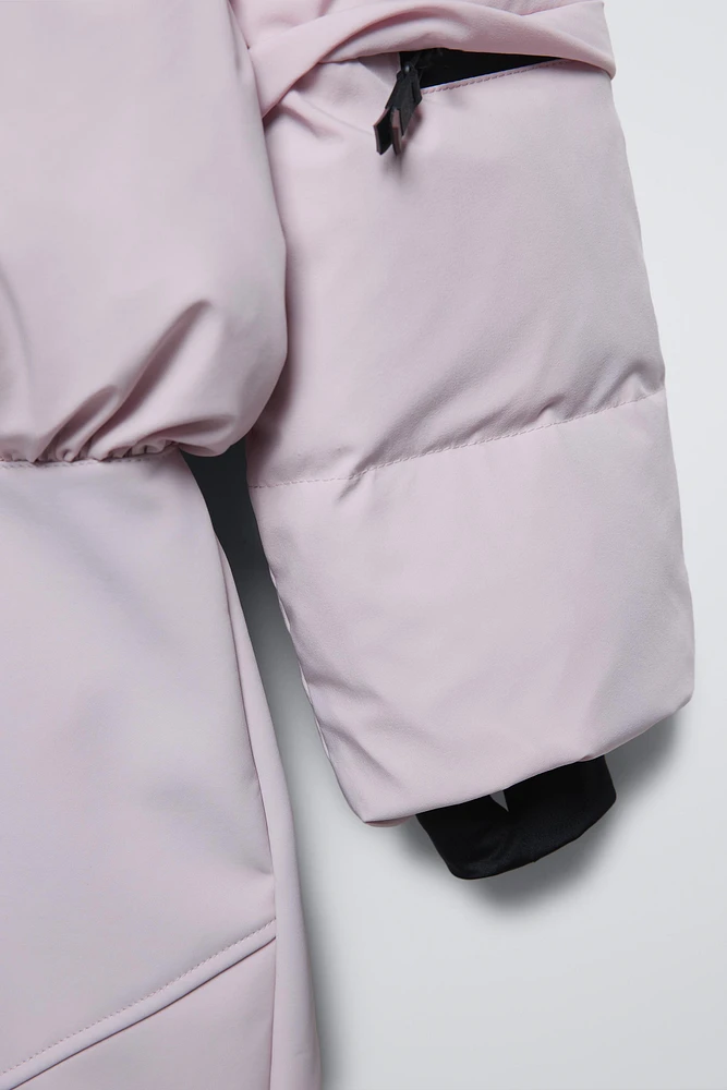 COMBINAISON DE SKI EN PLUMES COUPE-VENT ET DÉPERLANTE RECCO® SYSTEM
