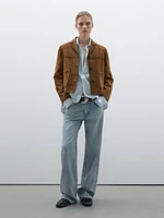 Veste avec poches en cuir effet daim