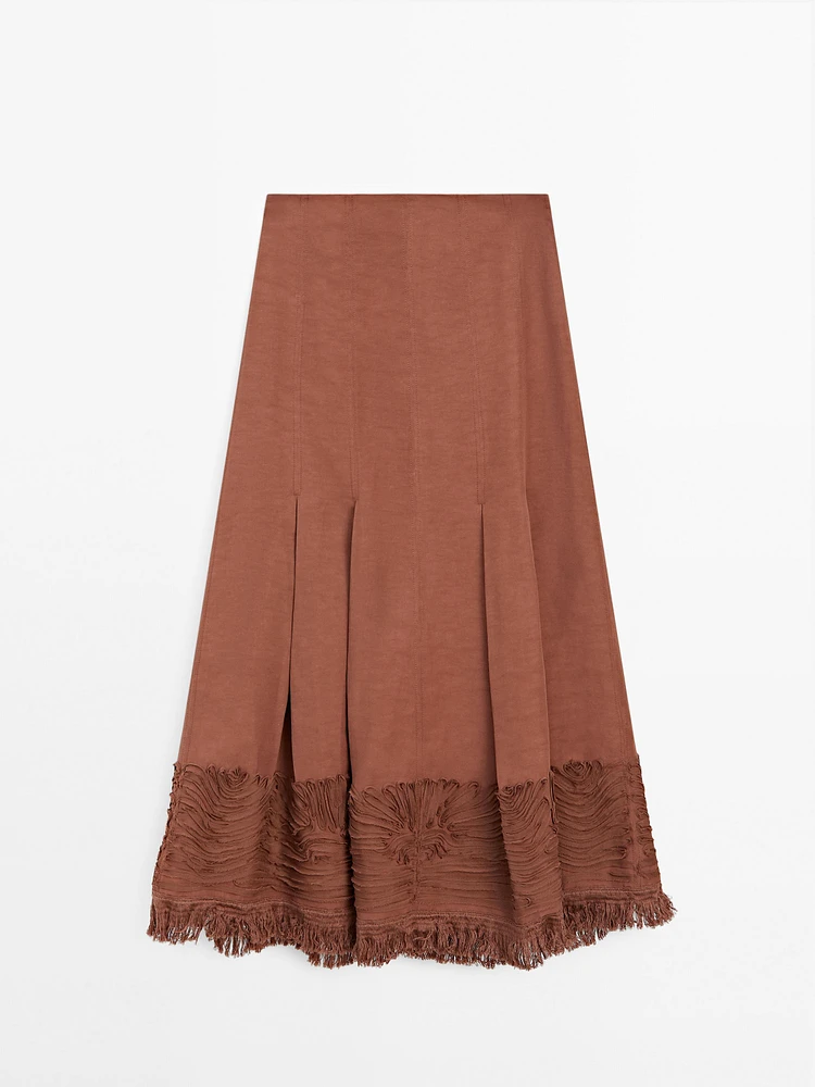 Jupe midi fluide avec broderie