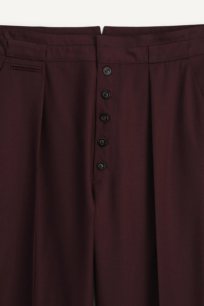 LIMITED EDITION PLEATED WOOL PANTS