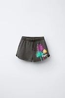 PALM TREE PRINT BERMUDA SHORTS