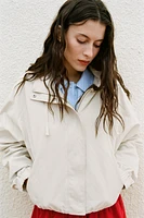 VESTE À CAPUCHE