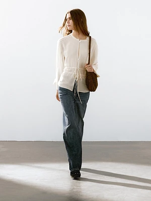 Flowing semi-sheer blouse with ties