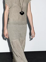 Long pleated skirt with flecked detail