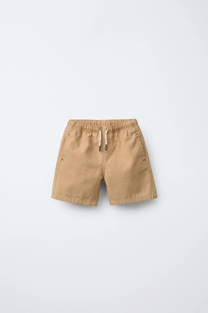 CONTRASTING POCKET TWILL SHORTS
