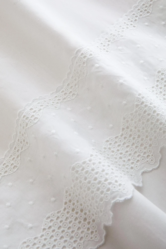 DRAP PLAT BRODÉ