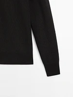 Cotton knit sweater with buttoned neck