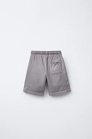 PLUSH SHORTS WITH EMBROIDERED LABEL