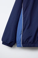 WATER REPELLENT TEXT PRINT HOODED RAINCOAT