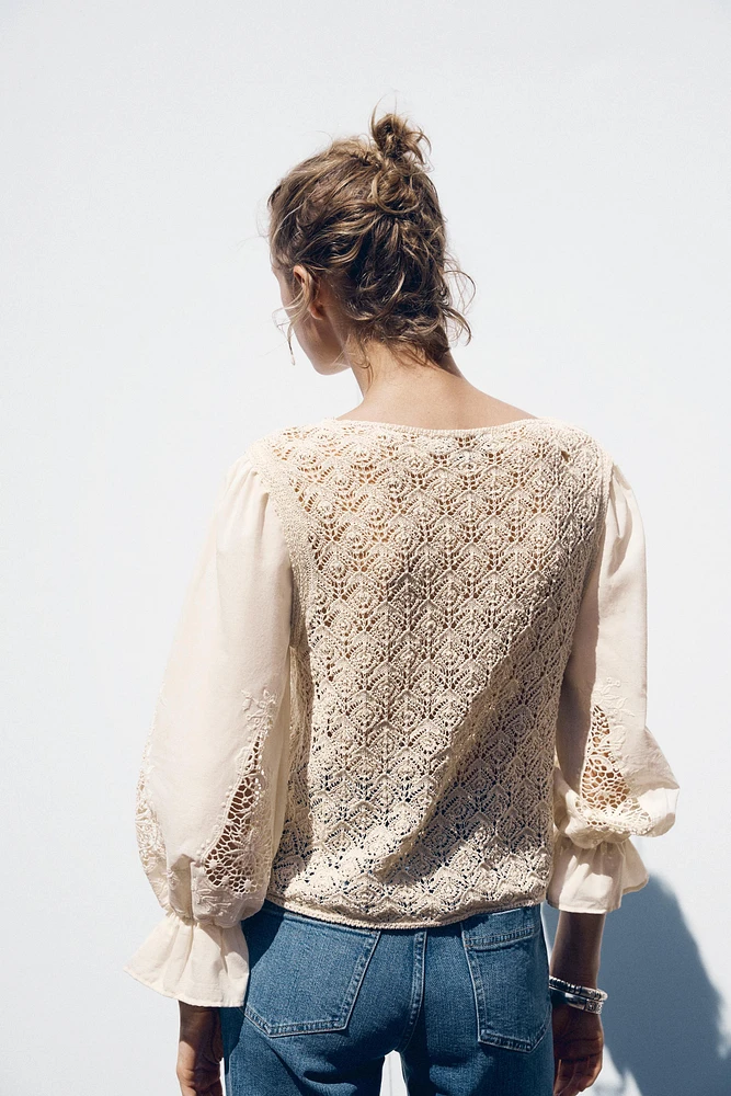 POINTELLE KNIT SWEATER WITH CONTRASTING SLEEVES