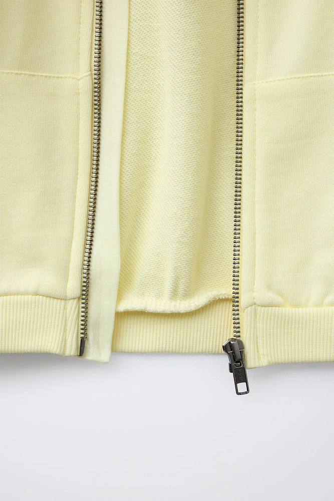 HOODED SWEATSHIRT WITH RAISED TEXT