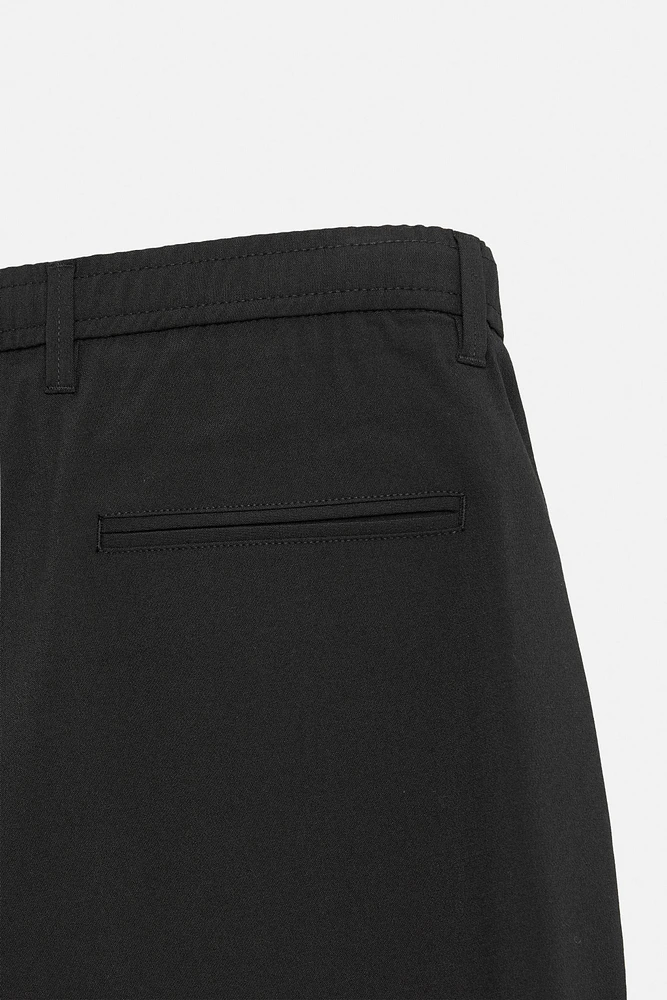 SLIM FIT STRETCH PANTS