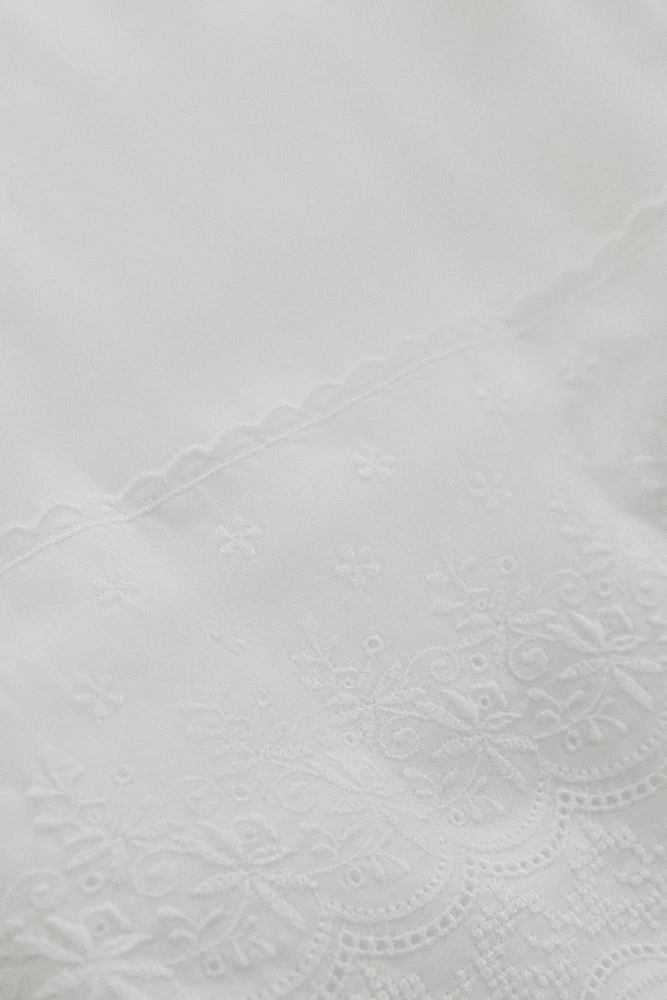 DRAP PLAT BRODÉ