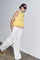 FRINGED CHECKERED KNIT TOP