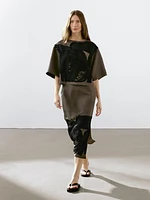 Flowing blouse with contrasting ribbons