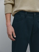 Faux jean tapered fit en coton mélangé