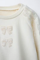 ROMANTIC BOW SWEATSHIRT