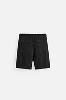 SHORT EN JACQUARD GÉOMÉTRIQUE