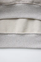 HEATHERED TEXT SWEATSHIRT