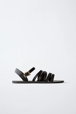 SANDALES À BRIDES EN CUIR