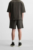 TEXTURED EMBROIDERED SHORTS