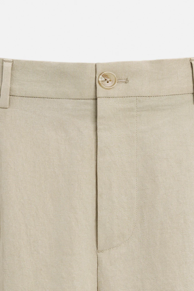 PANTALON COUPE LARGE À PLIS