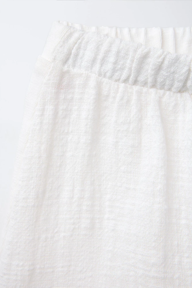 PLAIN COMBINATION BERMUDA SHORTS