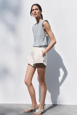 WASHED EFFECT T-SHIRT WITH SHOULDER PADS