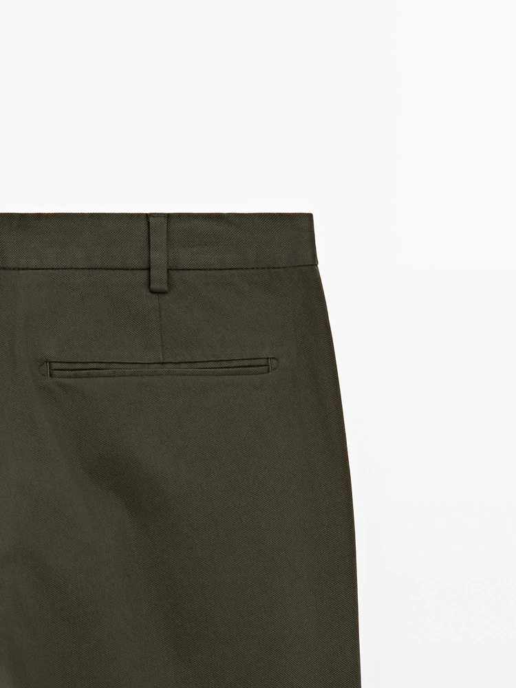 Cotton blend textured slim fit trousers