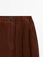 Low-rise cropped suede leather trousers
