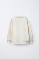 DRAWSTRING TIE SWEATSHIRT