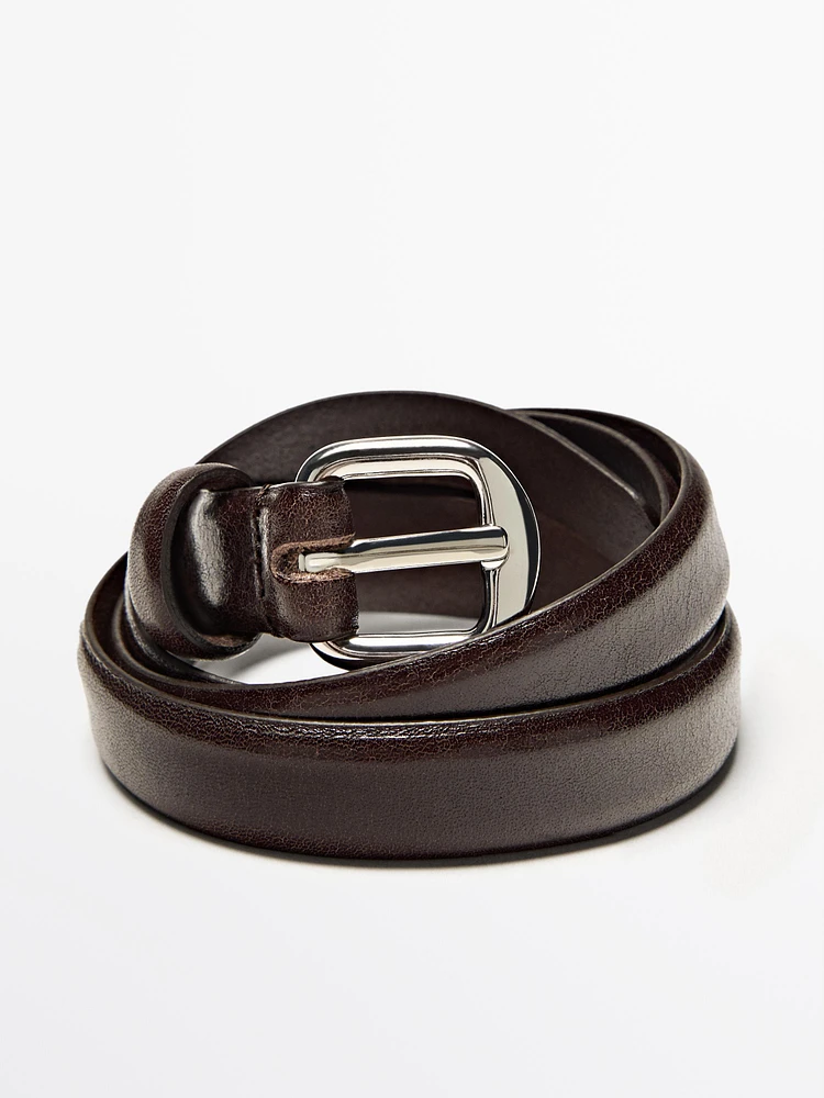 Leather belt with arched buckle