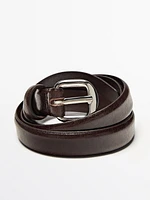 Leather belt with arched buckle
