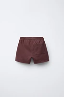 HÔTEL MAGIQUE © X ZARA PLUSH SHORTS