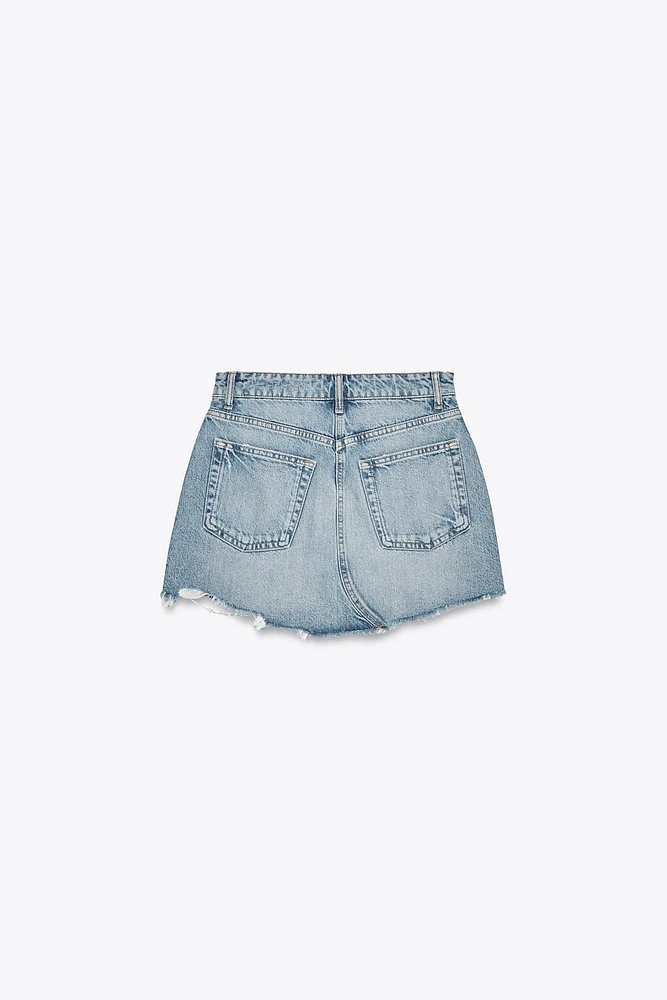 MINI JUPE EN JEAN TRF DÉCHIRÉE