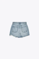 MINI JUPE EN JEAN TRF DÉCHIRÉE