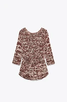 COMBINATION KNIT PEPLUM SWEATER