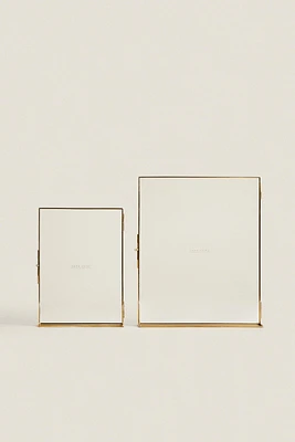 PICTURE FRAME WITH GOLD STAND