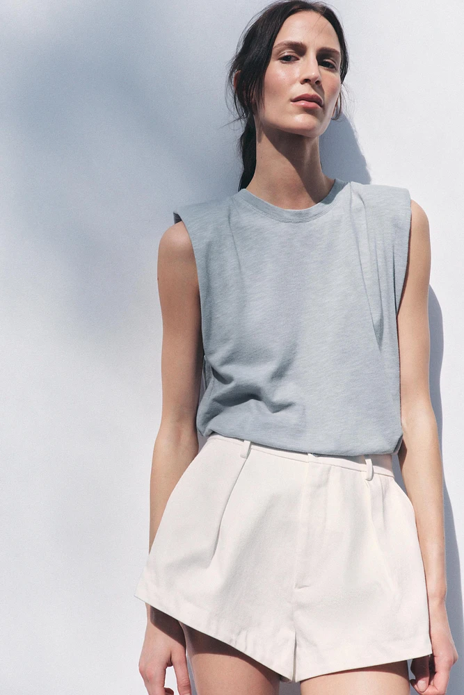 WASHED EFFECT T-SHIRT WITH SHOULDER PADS
