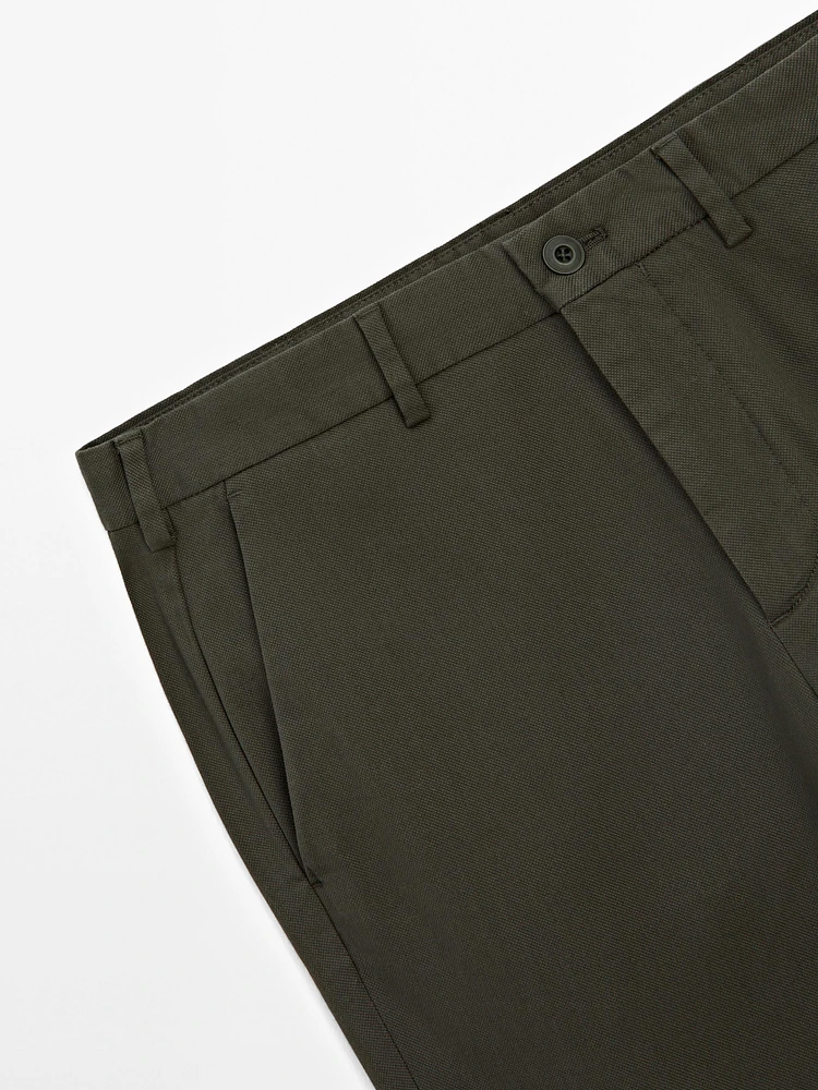 Cotton blend textured slim fit trousers